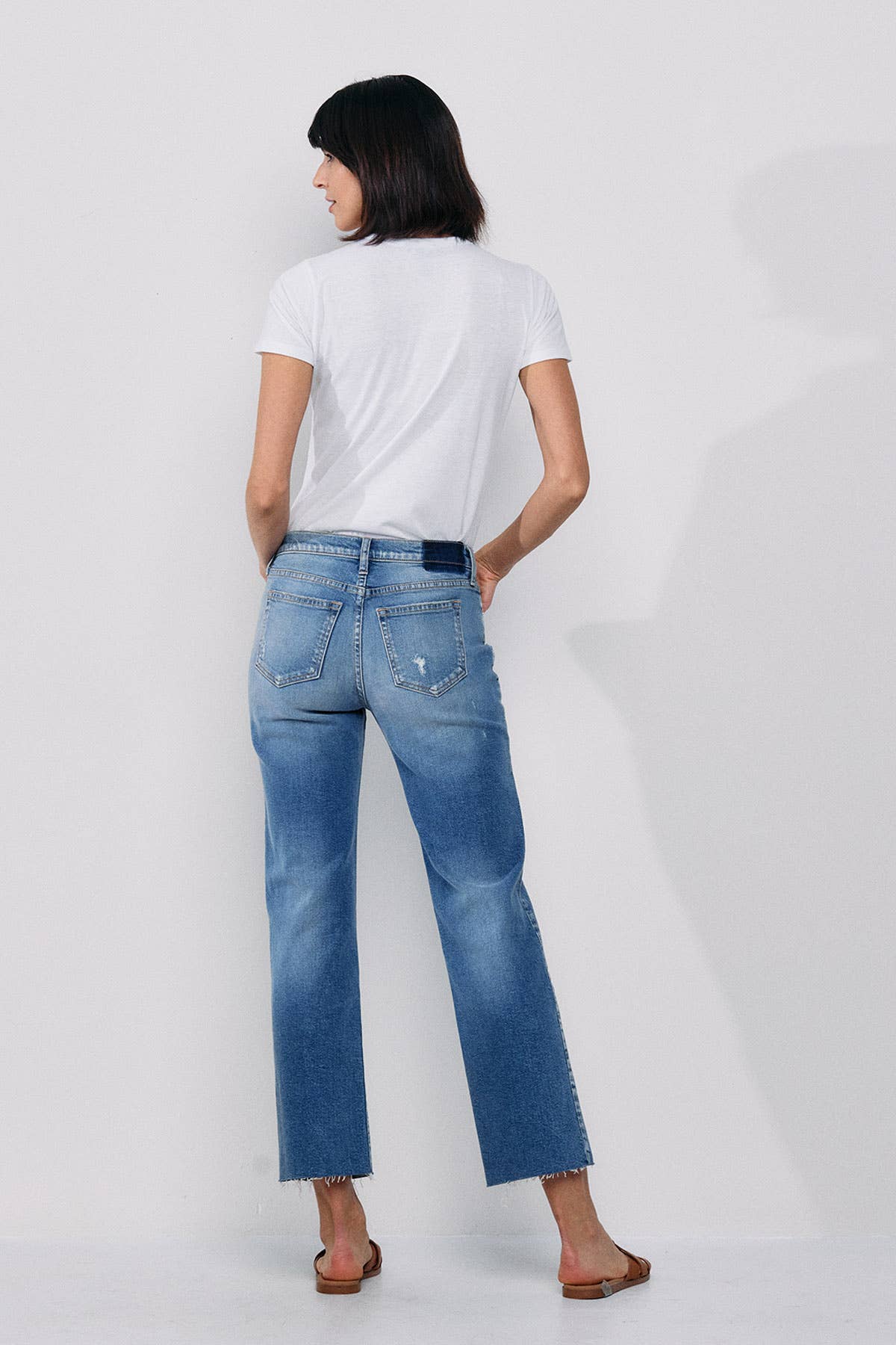 SNEAK PEEK- MID RISE STRAIGHT JEANS WITH KNEE RIPS